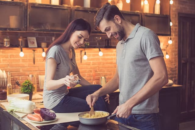 Couple cooking together